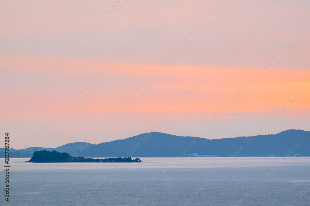 Scenic view of island during sunset