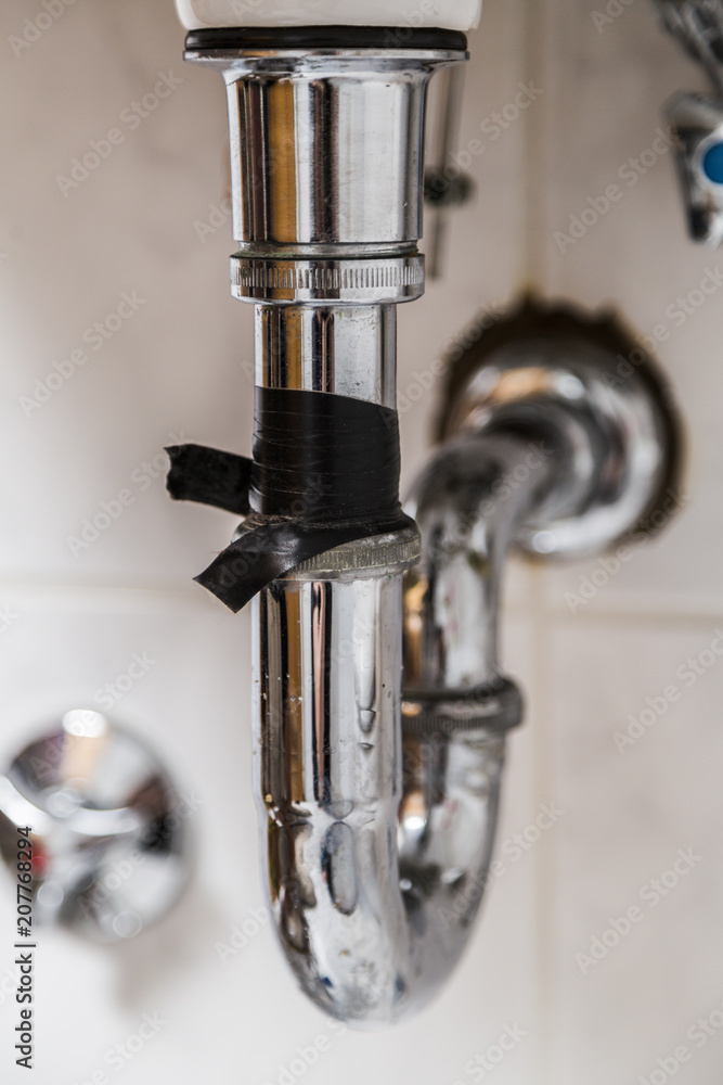 old flowing drainpipe in kitchen or bathroom old flowing drainpipe in kitchen or bathroom