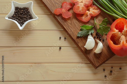 vegetables with pepper on a cutting board