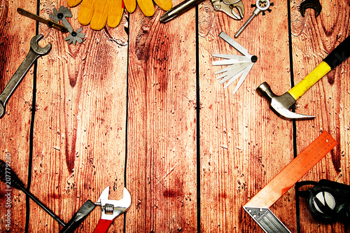 Top view close up of variety handy tools on wood background with copy space for your text for Worker's day, labour's day background