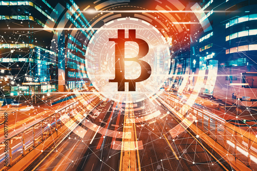 Canvas Print Bitcoin with view of motion blurred traffic