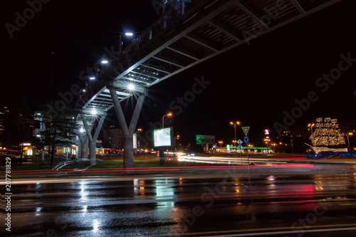 BURGAS  BULGARIA - FEBRUARY 4  2018  circular motion at the crossroads. Overhead pedestrian bridge at night