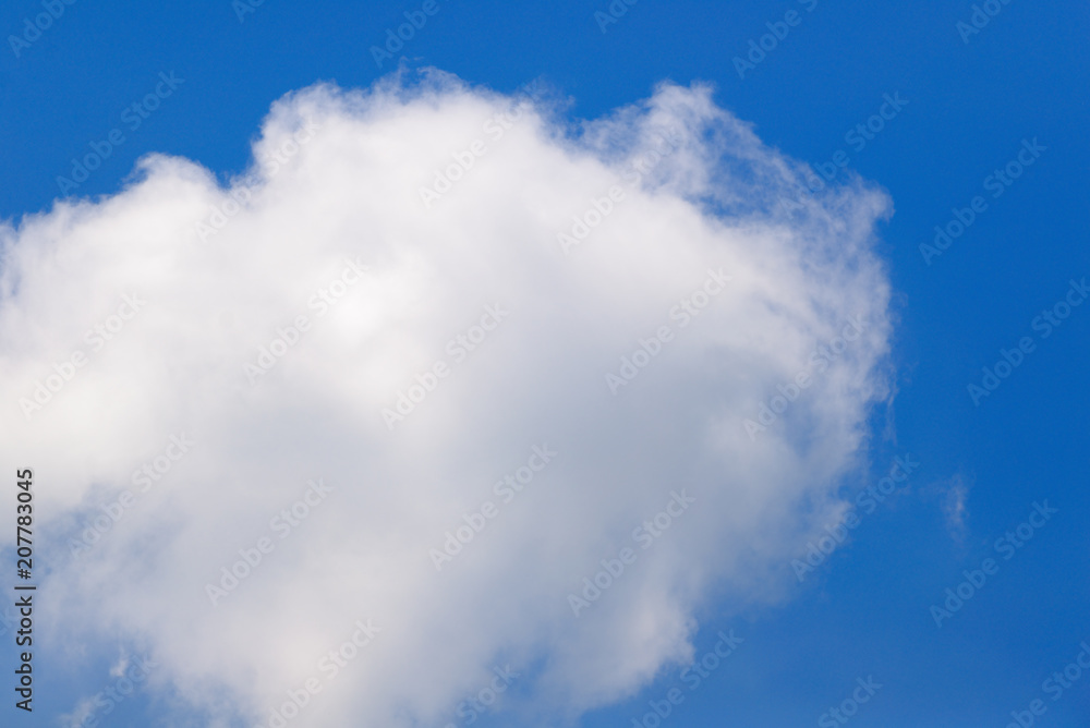 Big white clouds in the summer sky. Big white clouds in the summer sky.