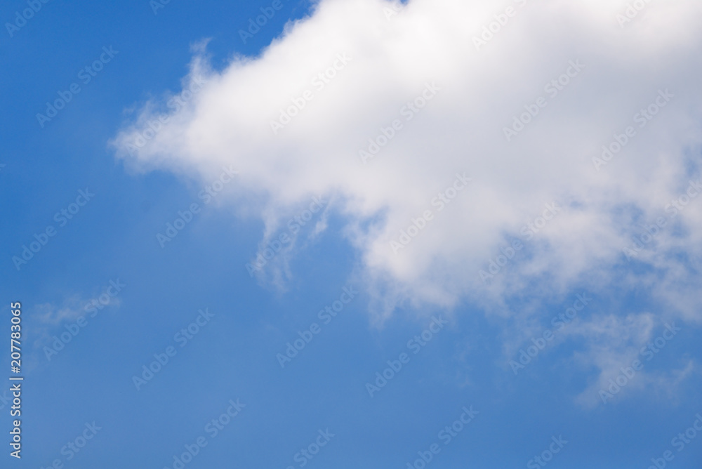 Big white clouds in the summer sky. Big white clouds in the summer sky.