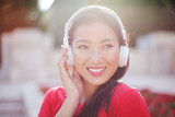 Smiling woman wearing headphones