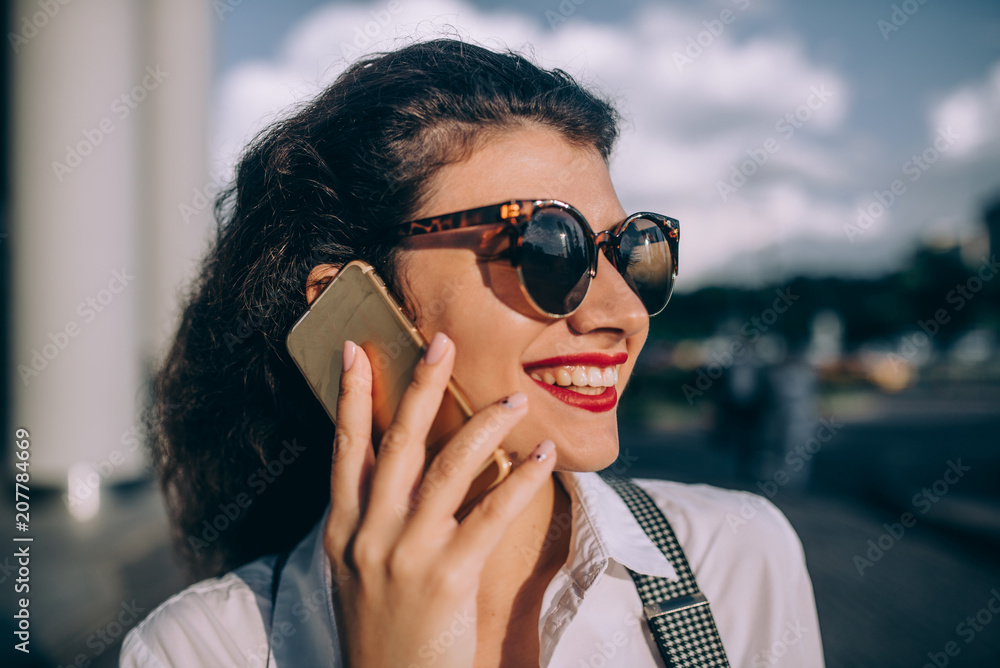 Young woman talking on the phone Young woman talking on the phone
