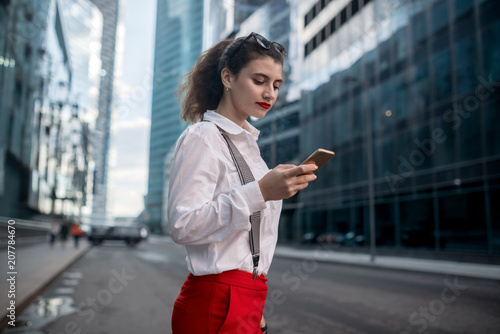 Business Woman With Phone Near Office