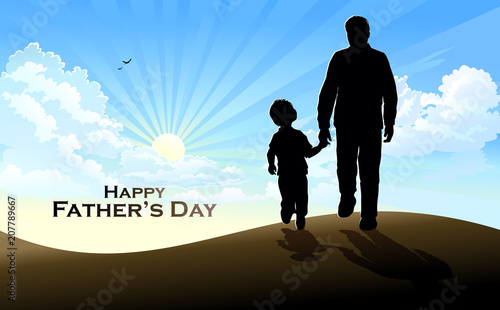 The silhouette of a father and son walking into the sunrise. 