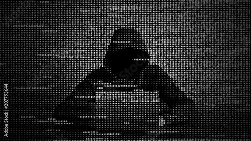 Hacker in data security concept. Hacker using laptop. Hacking the Internet. Cyber attack.