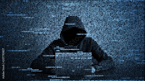 Hacker in data security concept. Hacker using laptop. Hacking the Internet. Cyber attack. photo