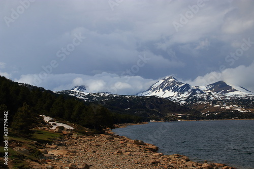 Pyrenean lake of Bouillouses and peak Peric in Capcir, Pyrenees orientales in southern of France