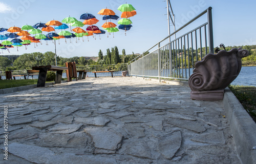 View from park in Beloslav town. The town is located 19 km west of Varna. It is situated on the two banks of the deep water channel Varna - Devnya. Beloslav is situated downhill between several hills. photo