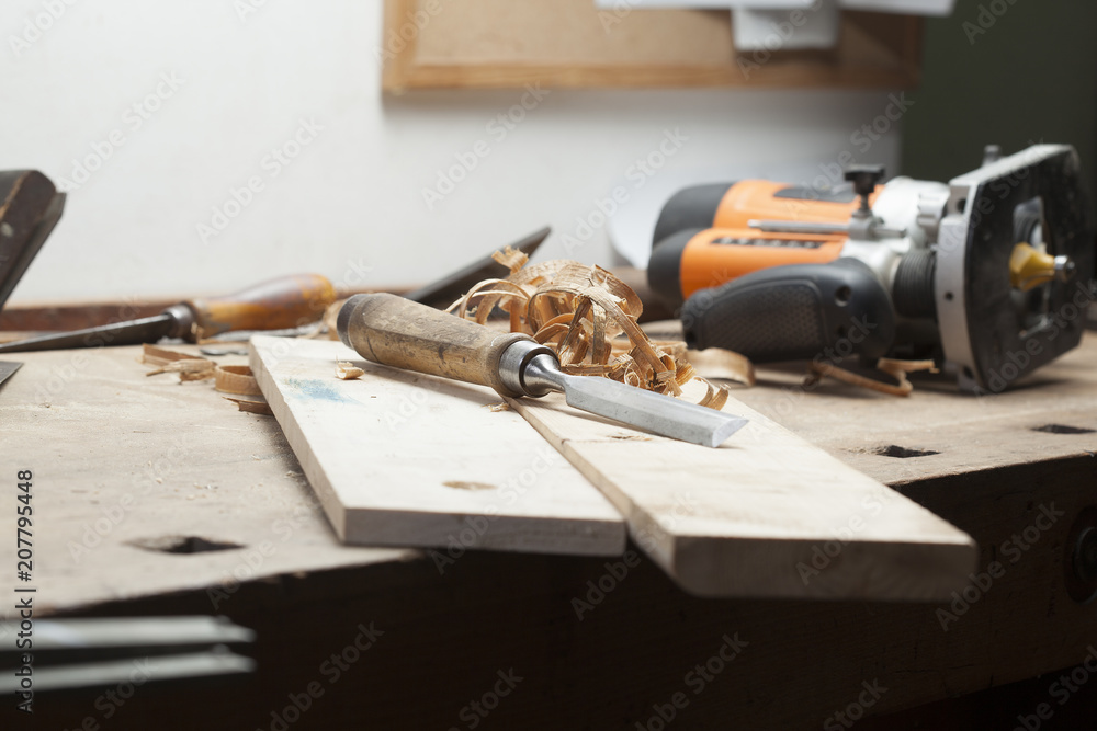 chisel an sawdust on wooden board.copy space