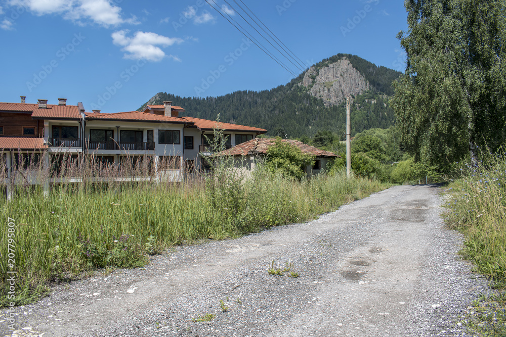 Rocks above the town of Smolyan. A picturesque view over the longest town in Bulgaria. Rocks above the town of Smolyan. A picturesque view over the longest town in Bulgaria.