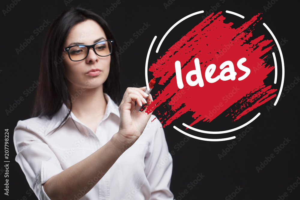 The concept of marketing, technology, the Internet and the network. A young businessman shows what is important for business: Ideas The concept of marketing, technology, the Internet and the network. A young businessman shows what is important for business: Ideas