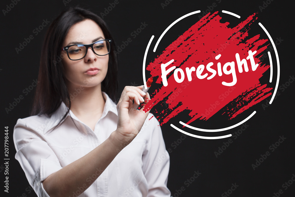 The concept of marketing, technology, the Internet and the network. A young businessman shows what is important for business: Foresight The concept of marketing, technology, the Internet and the network. A young businessman shows what is important for business: Foresight