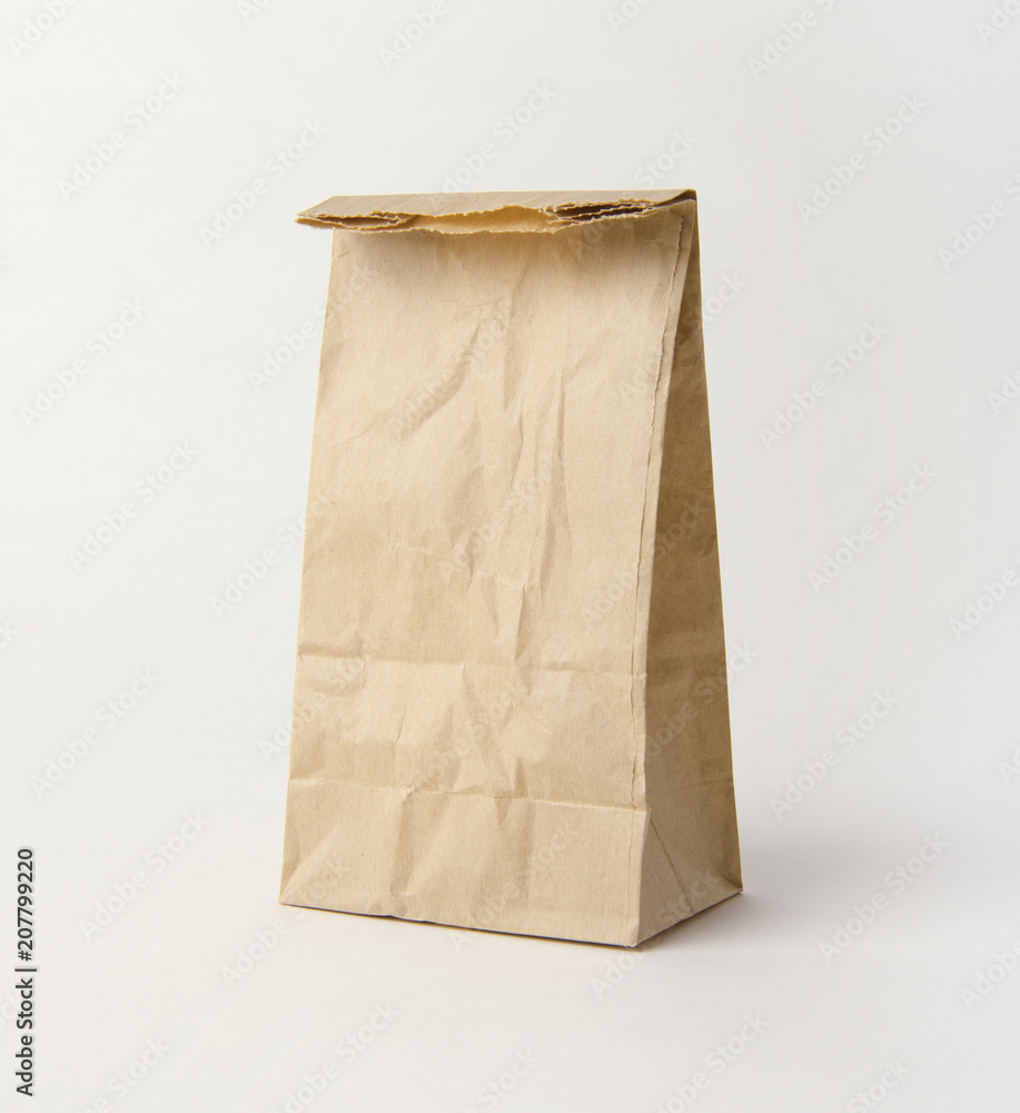Blank brown paper bag for mockup template advertising and branding background. Blank brown paper bag for mockup template advertising and branding background.