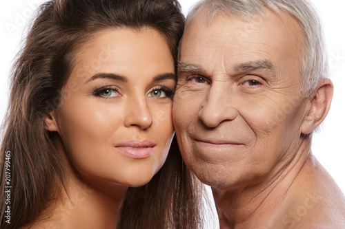 Happy elderly father and his beautiful daughter