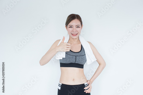 Young Fitness Asian girl ware sports bra with copy space