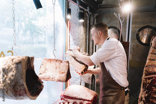 Butcher working in the Madrid city photo