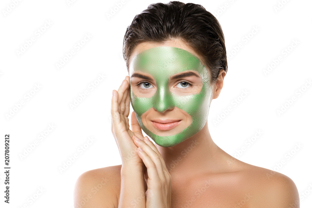 Woman with green peel-off mask on her face Woman with green peel-off mask on her face