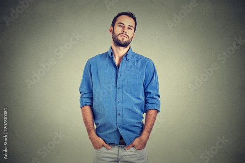 Photos Overconfident man in blue shirt