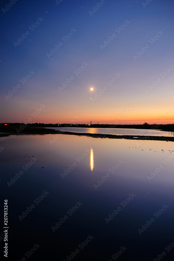 Beautiful landscape of moon over the sea