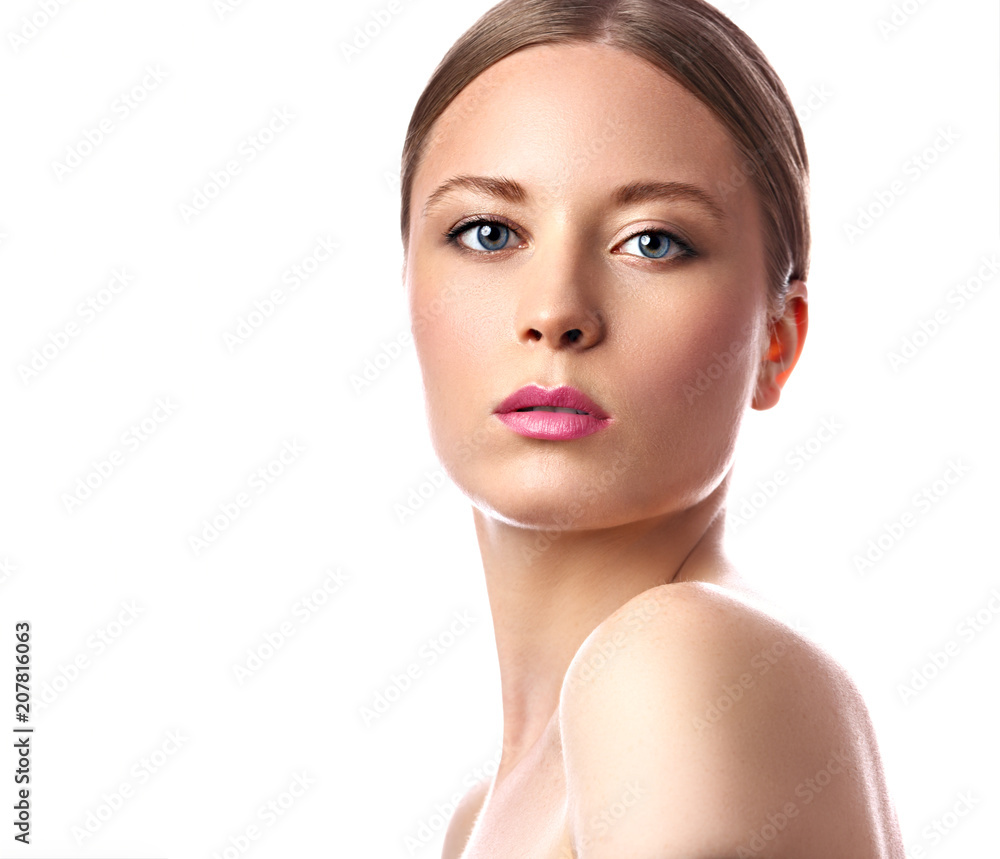 Beauty nude makeup woman with pink lipstick. Blond hairstyle. Closeup bright isolated portrait