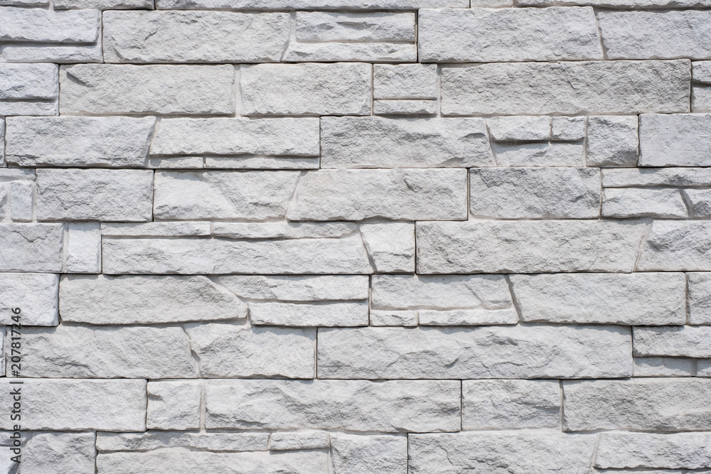 Fototapeta premium tiled natural stone wall background - granite stone texture