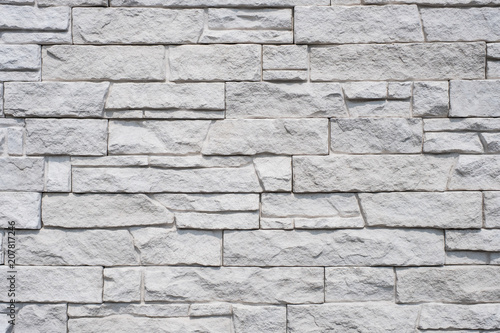 tiled natural stone wall background - granite stone texture