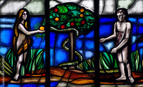 Adam and Eve with snake in Paradise (stained glass)