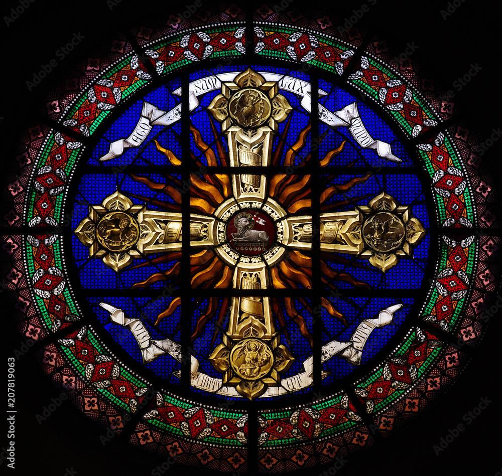 Holy Cross with lamb and symbols of evangelists (stained glass) 