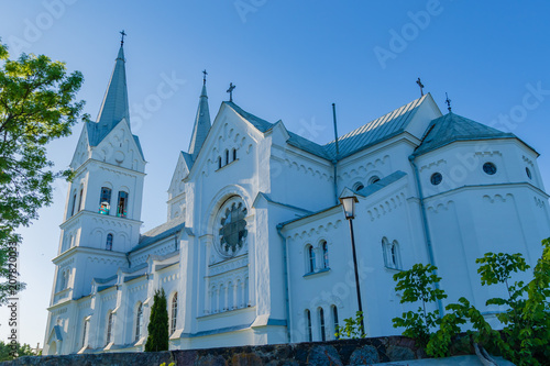 Majestic white Church of the Heart of Jesus in Slobodka, Belarus. The combination of Gothic and Roman style photo