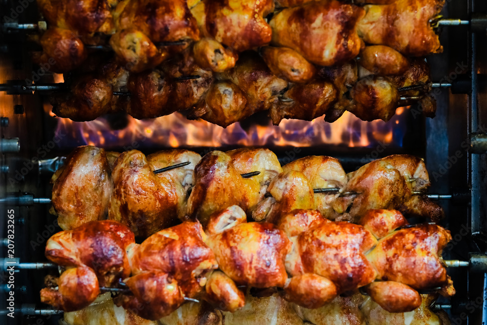 Rotating chicken at street food