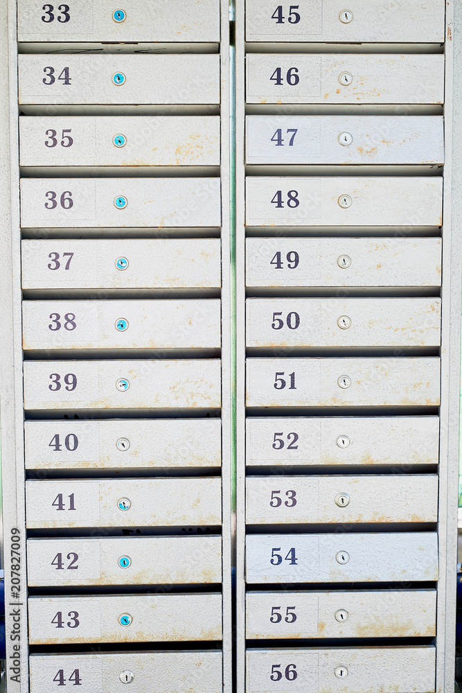 post metal cells. texture. With numbers. Home mail in an apartment building post metal cells. texture. With numbers. Home mail in an apartment building