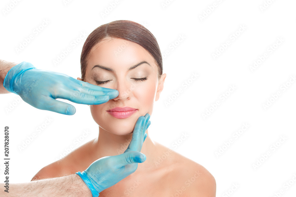 Woman is preparing for nose surgery, white background Woman is preparing for nose surgery, white background