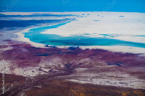 Aerial view of the Salar de Uyuni and its coast, Bolivia. Southern edge of salt flats partly covered with water.