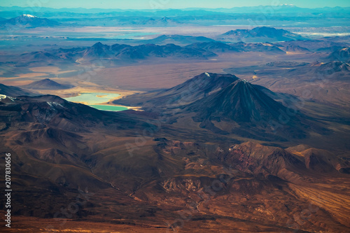 Aerial view of Eduardo Avaroa National Reserve, conical volcano of Licancabur is on the right. Bolivia