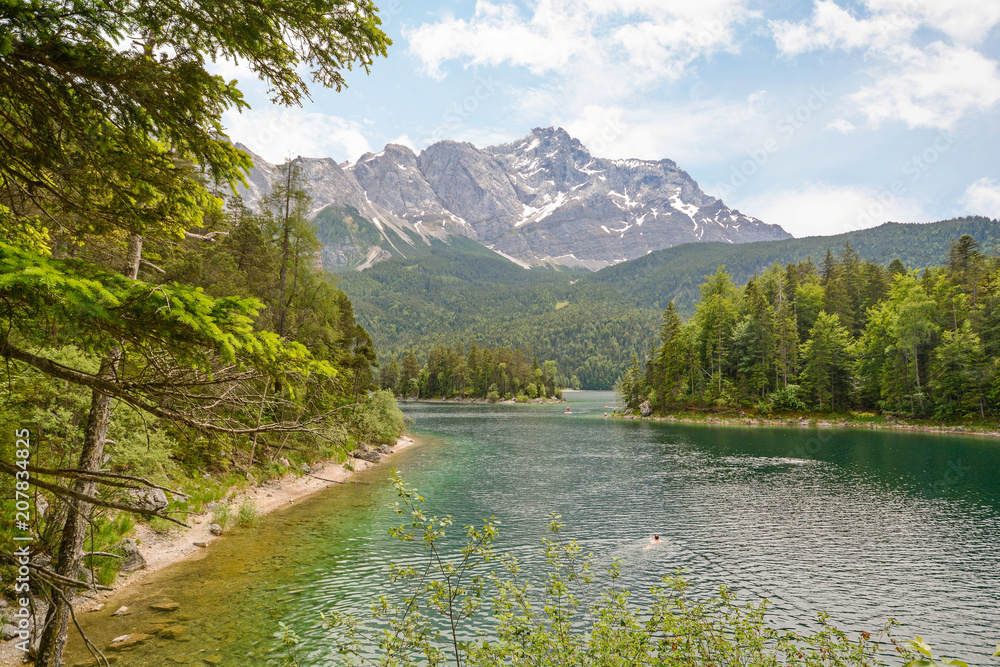 View to lake Eibsee and Zugspitze, Germany`s highest mountain in the bavarian alps, Bavaria Germany