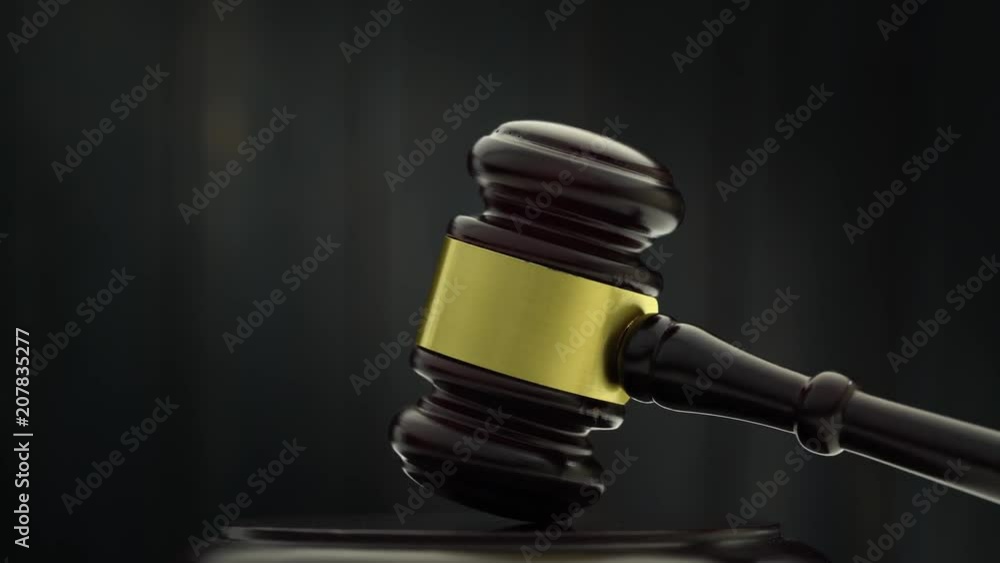 Wooden hammer revolves . Black background Wooden hammer revolves . Black background