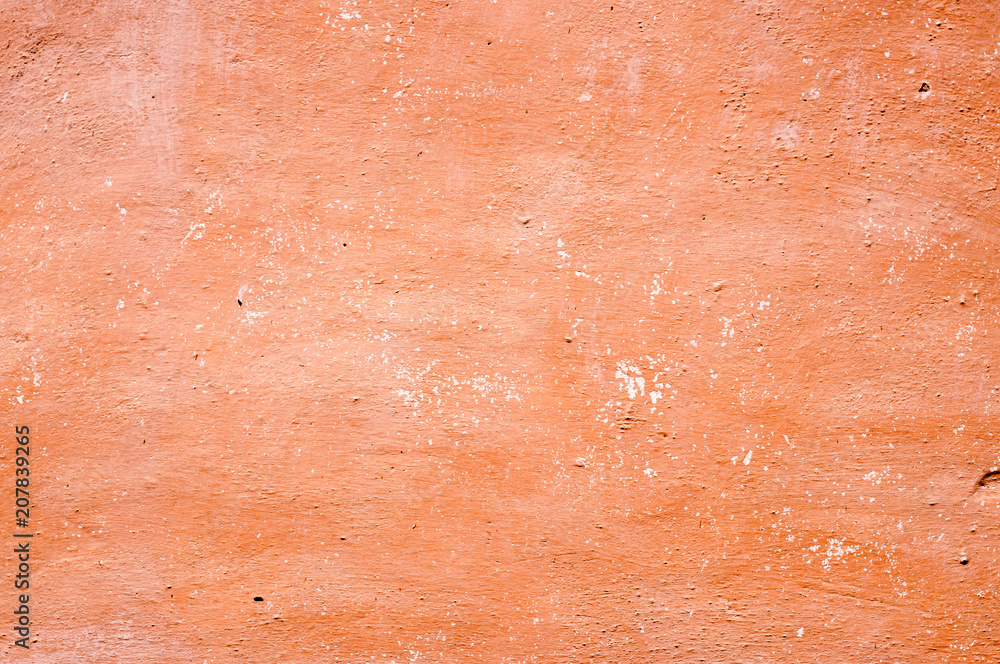 Texture of old wall covered with brown stucco Texture of old wall covered with brown stucco