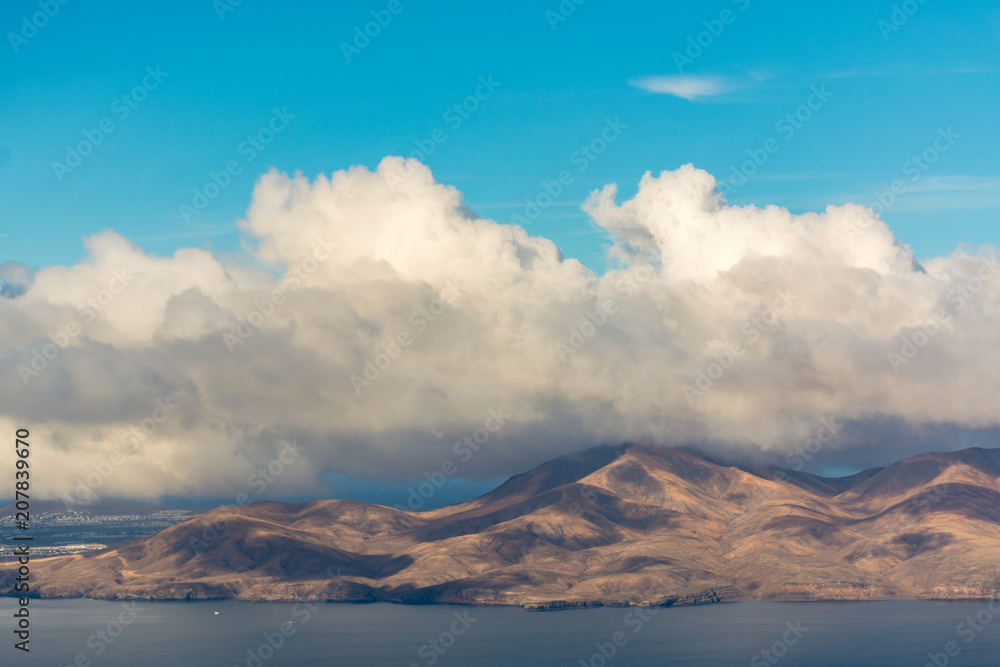 Fototapeta premium Aerial view of Lanzarote volcanic island, five minutes before landing Arrecife airport, Spain