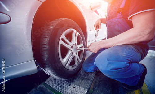 Automotive suspension test and brake test rolls in a auto repair service.