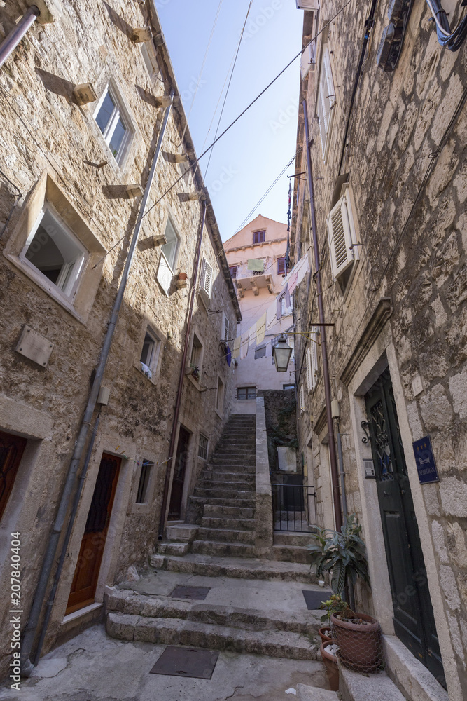 Old quiet alley in the old city of Dubrovnik, Croatia.