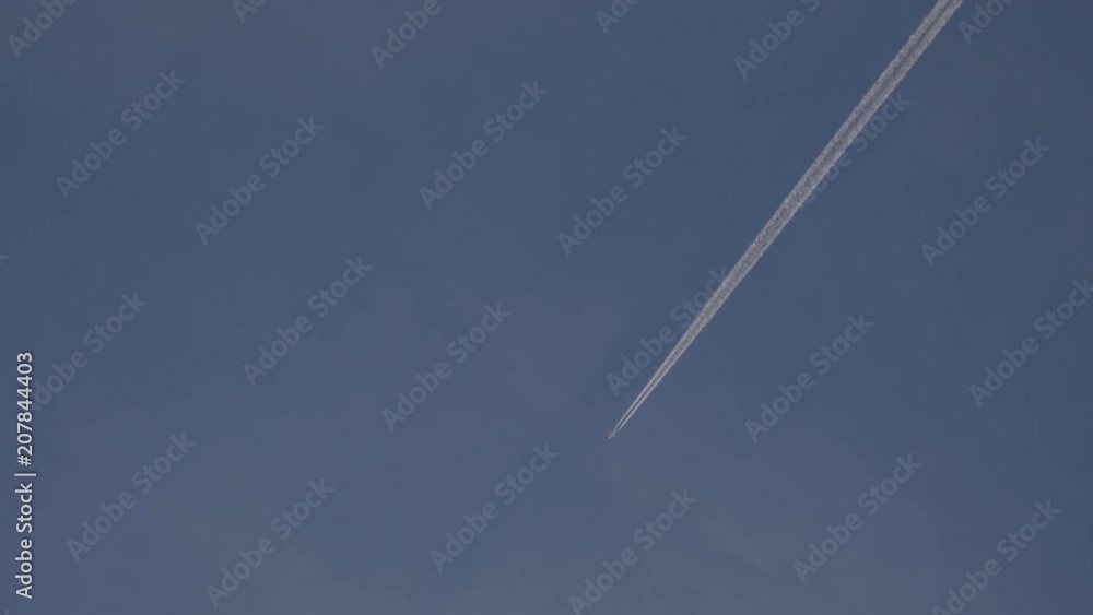 jet stream of airplane going in blue sky. jet stream of airplane going in blue sky.