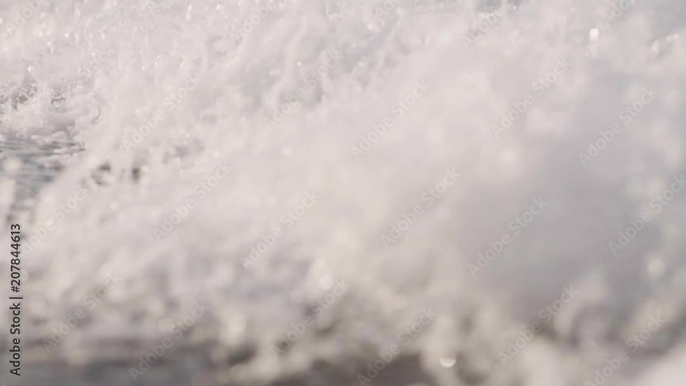 sea waves roll on a sandy beach sea waves roll on a sandy beach