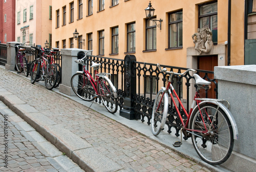 Red bicycles in Gamla Stan (Old Town) in Stockholm, Sweden