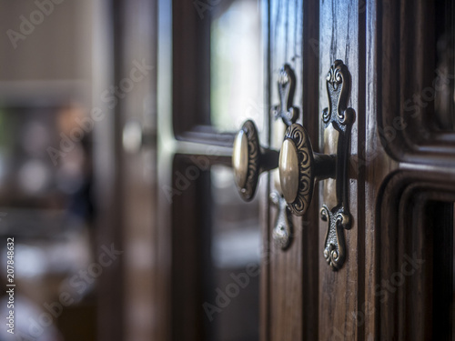 close up closed cupboard doors at home © Mihail