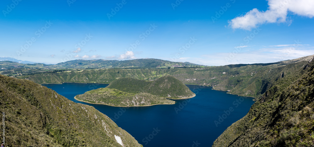 Panoramic of Cuicocha, beautiful blue lagoon inside the crater of Cotacachi volcano near Otavalo