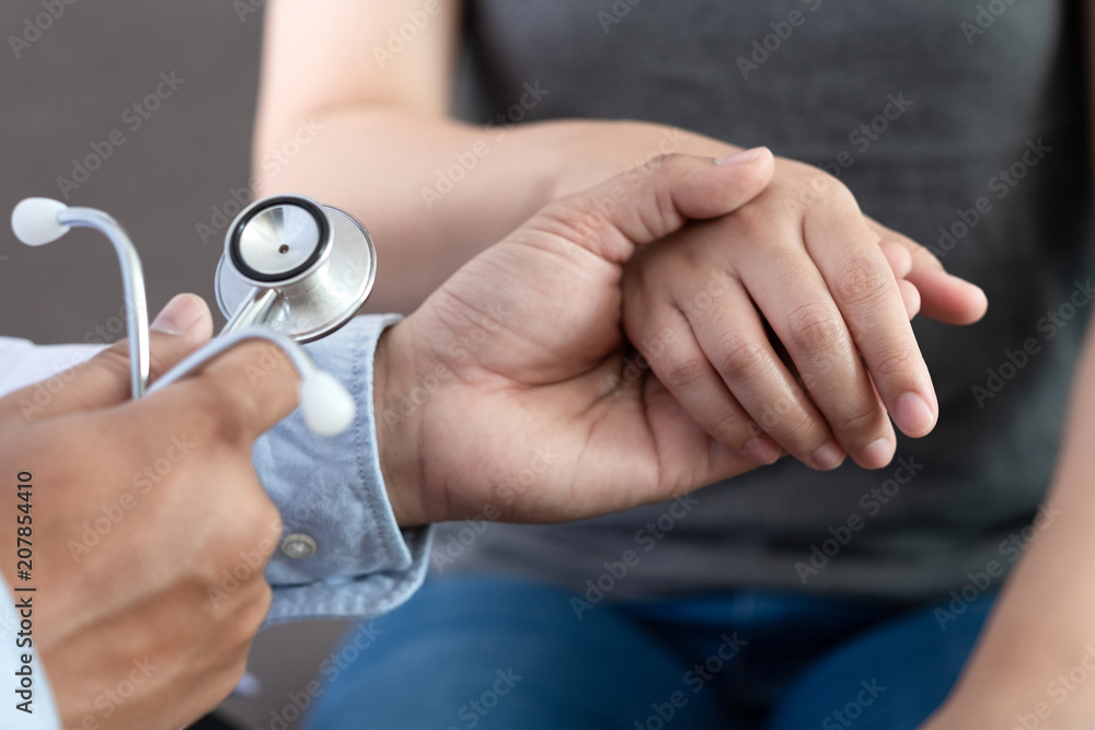 Medicine and health care concept Female patient at orthopedic medical exam Medicine and health care concept Female patient at orthopedic medical exam